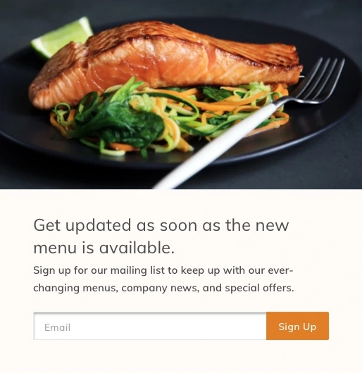 A newsletter sign-up card with a salmon dinner photo above a headline and email field